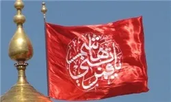 پرچم گنبد حرم حضرت ابوالفضل(ع) در نمایشگاه قرآن برافراشته شد